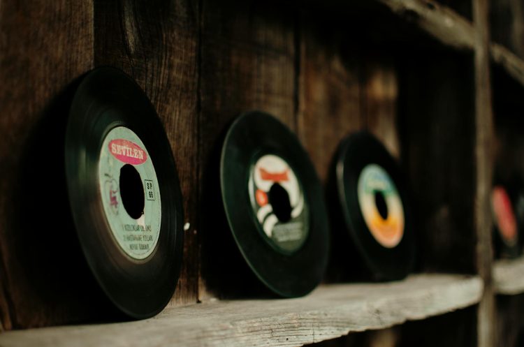set of colorful vinyl records in old fashioned store